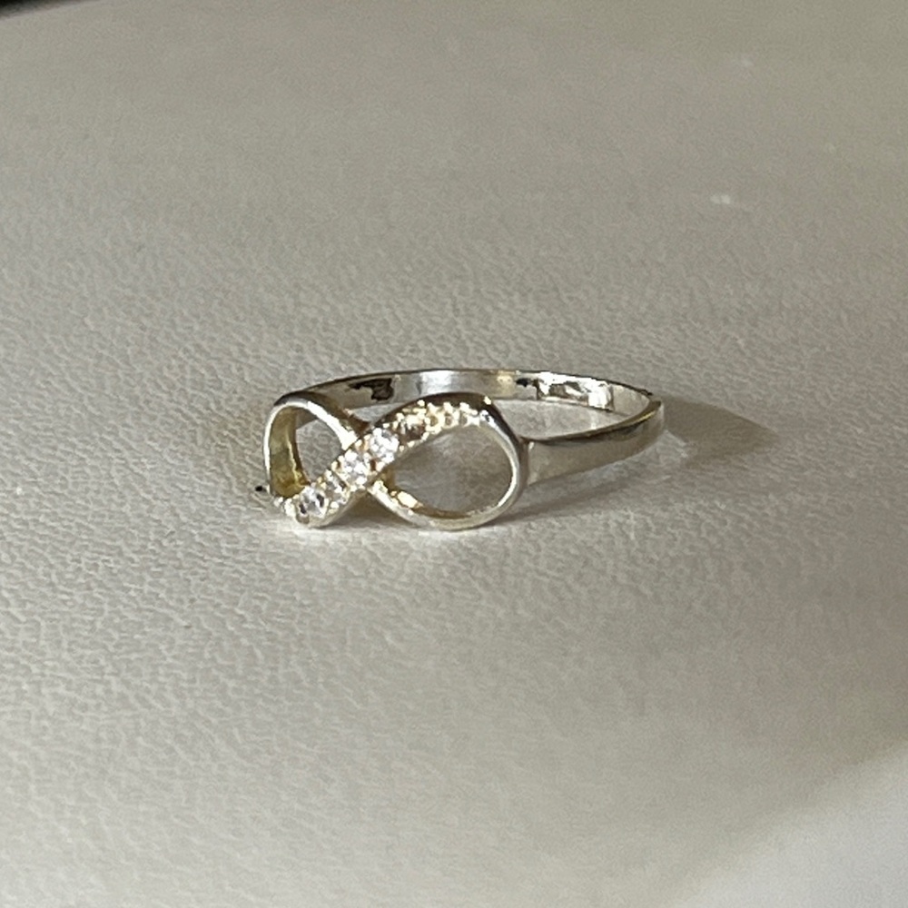 Gold Solitaire Diamond Ring with Intricate Detailing